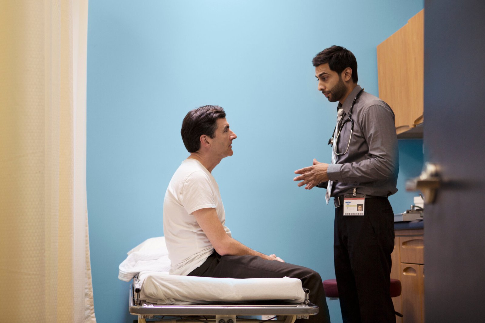 Eternal Health Solutions - Testosterone Replacement Therapy for Men - Doctor talking to male patient in examining room